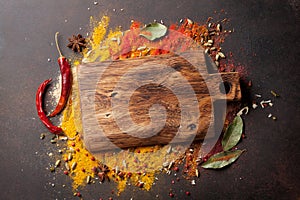 Various spices spoons and cutting board