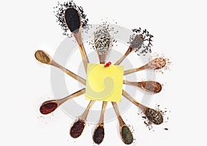 Various spices on white background. Top view with free space, and note.