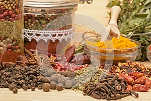 Various spices on wooden background