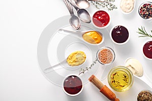 Various Spicy Rubs and Marinades on White Table