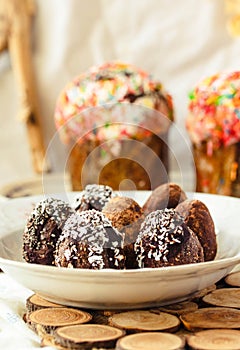 Various Spring Easter cakes with white icing and sugar decor on