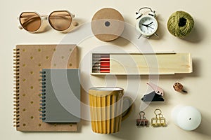 Various stationery, school office supplies on beige background