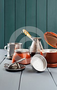 Various styles coffee makers on grey background. Italian moka po