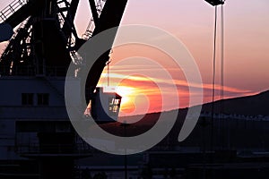 Various sunset views of the docks, piers, terminal of the Port of Huludao, China, November, 2020.
