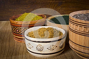 Various superfoods in wooden containers