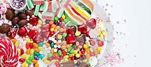 Various sweets assortment. Candy, bonbon, chocholate on white background