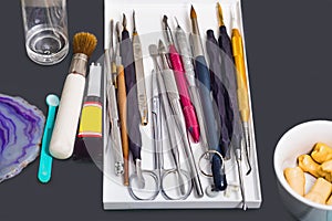 Various tools on a grey table