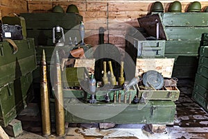 various types of ammunition and military equipment in basement