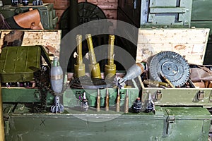 various types of ammunition and military equipment in basement.