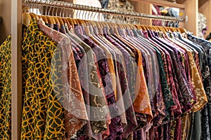 Various types of batik shirts for sale in the retail shop