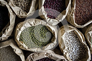 Various types of beans in multiple sacks