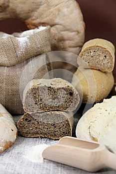 Various types of bread, white and whole grain bread loafs fresh