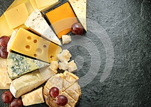 Various types of cheese with empty space background