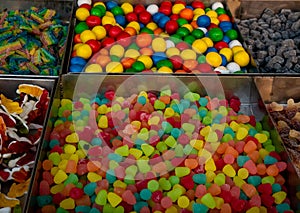 Various types of colorful candies with different flavors
