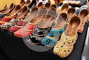 Various types of Indian jutti footwear selling in the shopping mall