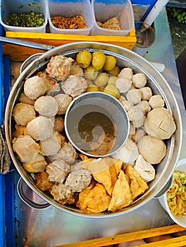 Various types of meatballs are sold in 1 attractive portion and become a promising street vendor business