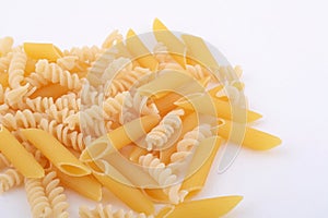 Various types of pasta on a white background.