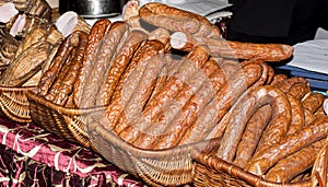 Various types of sausages in baskets