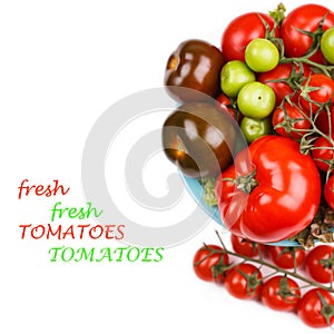 Various types of tomatoes in a bowl on the table