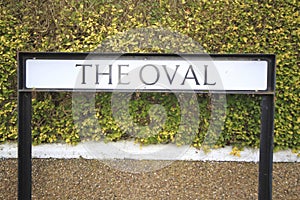 The oval street sign