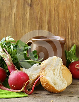 Various vegetables and herbs, bread and milk