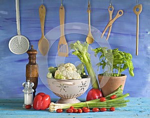 Various vegetables and kitchen utensils