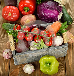 Various vegetables in a wooden box