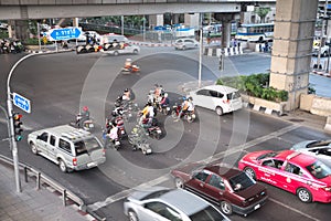 Various vehicles break law by stop car beyond the white line on the ground during red light