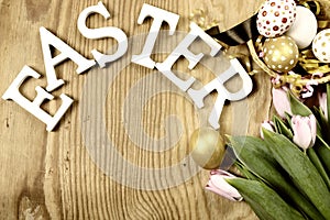 Toned background easter tulips and eggs