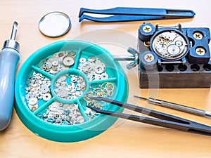 Various watch repairing tools and spare parts