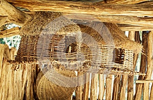 Various wicker bird houses and baskets