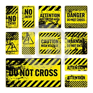 Various yellow grunge warning signs with diagonal lines. Old attention, danger or caution sign, construction site