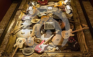 Varity of guitars hanging on the wall in hard Rock cafe Brussels