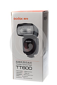 VARNA, BULGARIA - MARCH 21, 2020: Godox Thinklite Camera Flash TT600 box, isolated on white background. GODOX is a professional