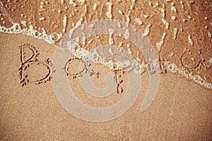 Varna writen on a beach sand photo