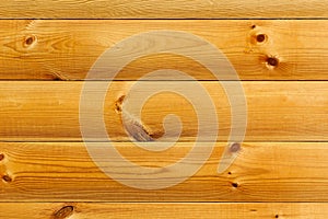 The varnished boards. The wood texture.