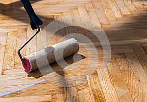 Varnished parquet roller