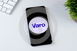 Varo: Mobile Banking app logo on a smartphone screen.