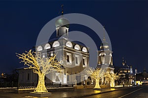 Varvarka street with churches of St. Barbara with bell tower and Maxim the Confessor Maxim the blessed at Christmas and New year