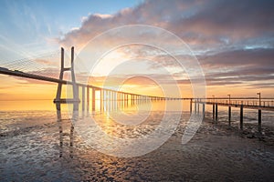 Vasco da Gama bridge in Lisbon by sunrise, Portugal.