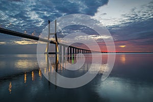 Vasco da Gama bridge over tagus river in Lisbon before sunrise