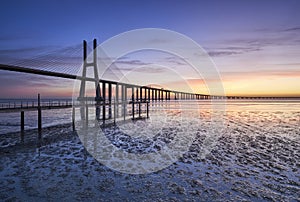 Long bridge over tagus river in Lisbon before sunrise