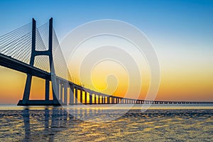 Vasco da Gama Bridge at sunrise photo