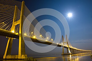 Vasco da Gama bridge under moonlight photo