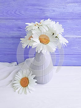 Vase daisy, holiday on a beauty romantic wooden