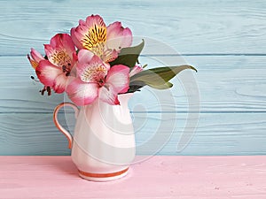 Vase flower spring alstroemeria seasonal on a wooden arrangement