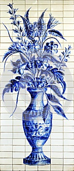 Vase of flowers painted on tiles at the entrance of a Spanish flower shop.