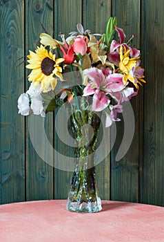 Vase of plastic flowers