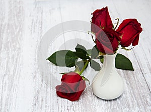 Vase with red roses