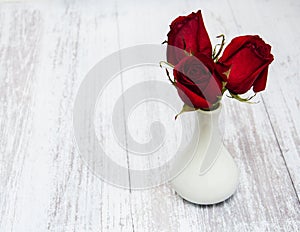 Vase with red roses